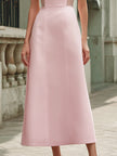 Elegant pink off-the-shoulder sleeveless maxi dress by FJØRNA with flowing fabric and fitted bodice, perfect for formal occasions.