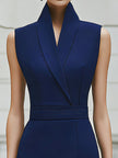 FJØRNA chic sleeveless midi dress with lapel collar, structured design, and elegant silhouette, suitable for formal occasions.