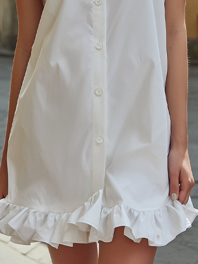 FJØRNA sleeveless button-front mini dress with ruffle hem, stylish and casual summer dress, black fabric, front buttons, and sleeveless design.