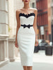 FJØRNA scalloped trim bow waist structured pencil midi dress displayed on a model, featuring elegant design and fitted silhouette