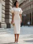 FJØRNA minimalist halter neck column midi dress, elegant sleeveless design with a fitted silhouette and clean lines.