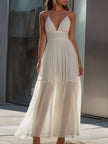 FJØRNA spaghetti strap pleated flowing maxi dress with a lightweight, elegant design and soft fabric, perfect for summer wear.