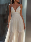 FJØRNA spaghetti strap pleated flowing maxi dress with a relaxed fit, lightweight fabric, and elegant design perfect for summer.