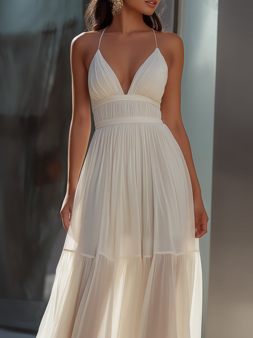 FJØRNA spaghetti strap pleated flowing maxi dress with a relaxed fit, lightweight fabric, and elegant design perfect for summer.