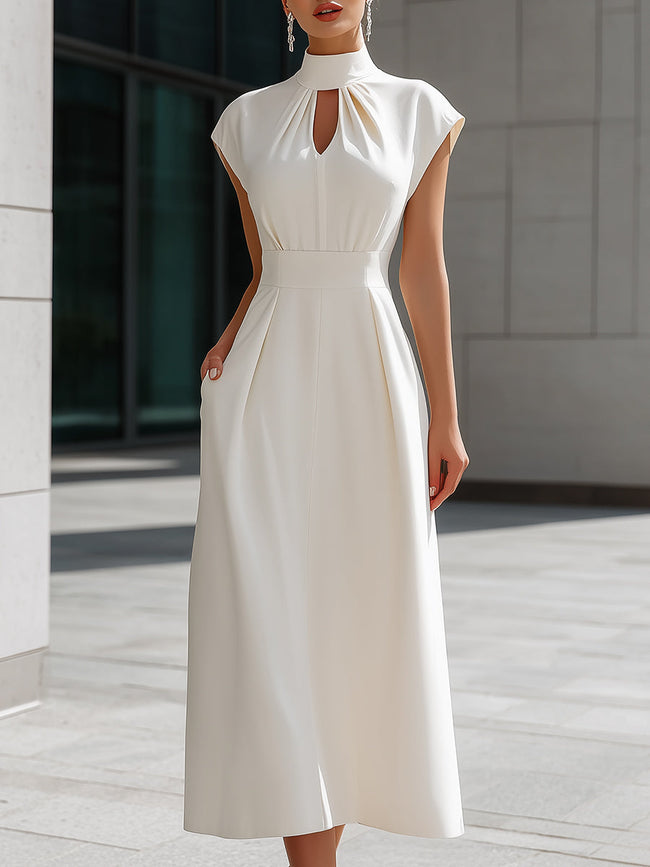 FJØRNA elegant high neck A-line midi dress with keyhole cutout at waist, stylish and sophisticated for special occasions.