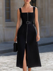Black square neck sleeveless belted zip-up midi dress with front slit by FJØRNA, shown on a model.