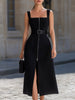 Black square neck sleeveless belted zip-up midi dress with front slit by FJØRNA, shown on a model.