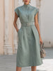 FJØRNA elegant stand collar belted button-down midi dress with long sleeves and a tailored fit, shown on a model.