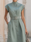 FJØRNA elegant stand collar belted button-down midi dress with long sleeves and a tailored fit, displayed on a hanger.