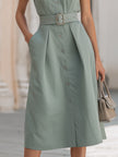 FJØRNA elegant stand collar belted button-down midi shirt dress displayed on a model with long sleeves and a sleek silhouette.