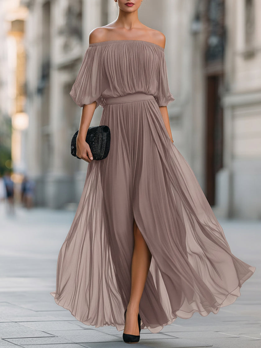 FJØRNA off-shoulder pleated chiffon maxi dress with flowing fabric and elegant design, perfect for formal occasions.