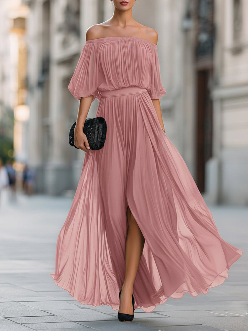 FJØRNA off-shoulder pleated chiffon maxi dress with flowing fabric and elegant design, suitable for formal occasions.