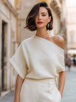 Ivory women’s one-shoulder top by FJØRNA featuring draped, relaxed fit and asymmetric design, perfect for stylish casual wear.
