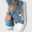 FJØRNA Elyana™ orthopedic sneakers in neutral tone, featuring cushioned soles and supportive design for comfort and stability.