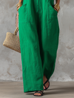 FJØRNA linen-blend sleeveless jumpsuit for women, loose-fit with stand collar and single-breasted design, perfect for casual wear.