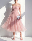Pink tulle midi dress for women by FJØRNA, featuring a flowy skirt and elegant design.