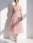 Pink tulle midi dress for women by FJØRNA, showcasing elegant flowy fabric and feminine design perfect for special occasions.