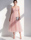 Pink tulle midi dress for women by FJØRNA, featuring a flowing silhouette and elegant design, perfect for special occasions.