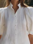 White linen puff sleeve two-piece co-ord set for women by FJØRNA, featuring a stylish top and matching pants.