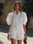 White linen puff sleeve two-piece co-ord set for women featuring pants, from FJØRNA, styled with a relaxed, elegant look.
