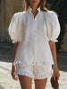 White linen puff sleeve two-piece pants set for women by FJØRNA, featuring a stylish top and matching wide-leg pants.