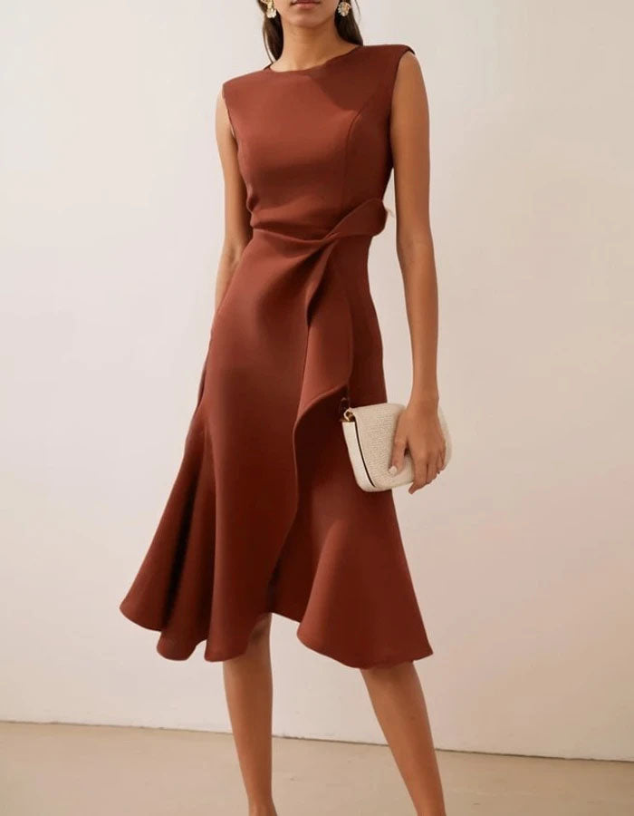 Pink FJØRNA midi dress for women with round neck, sleeveless design, ruffle and bow details.