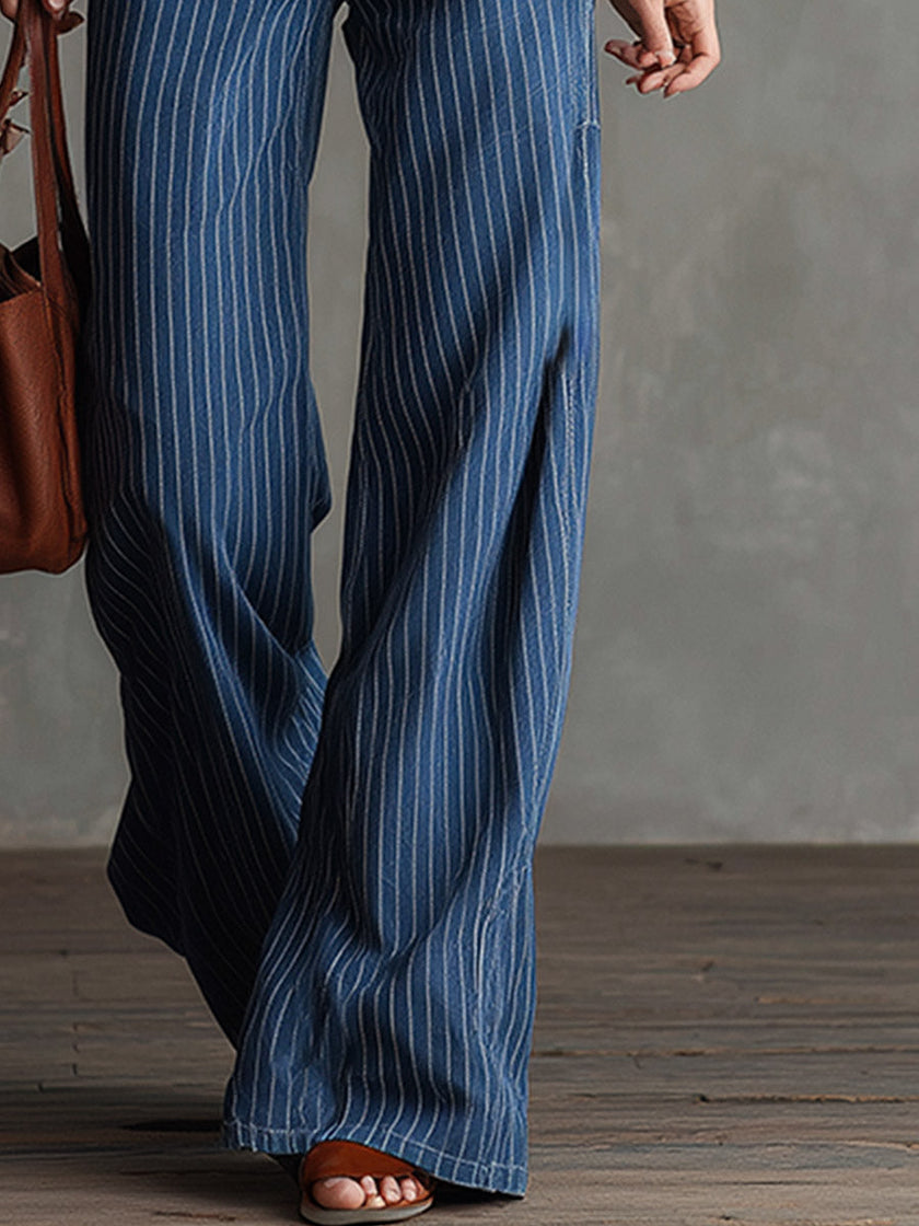 FJØRNA women's blue striped straight-leg jeans, casual pants with a classic fit and striped design, shown on a model.