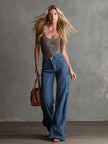 Blue striped straight-leg jeans for women by FJØRNA, showcasing fitted waistband and classic denim style.