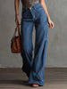 Blue striped FJØRNA women's straight-leg jeans, showcasing a casual pants style with a relaxed fit and classic design.