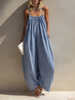 FJØRNA women's loose-fit sleeveless jumpsuit with square neck, gathered bodice, and wide-leg pants, shown in a light fabric.