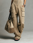 FJØRNA women's faux suede straight-leg overalls with zip front and multiple pockets, shown in a natural pose.