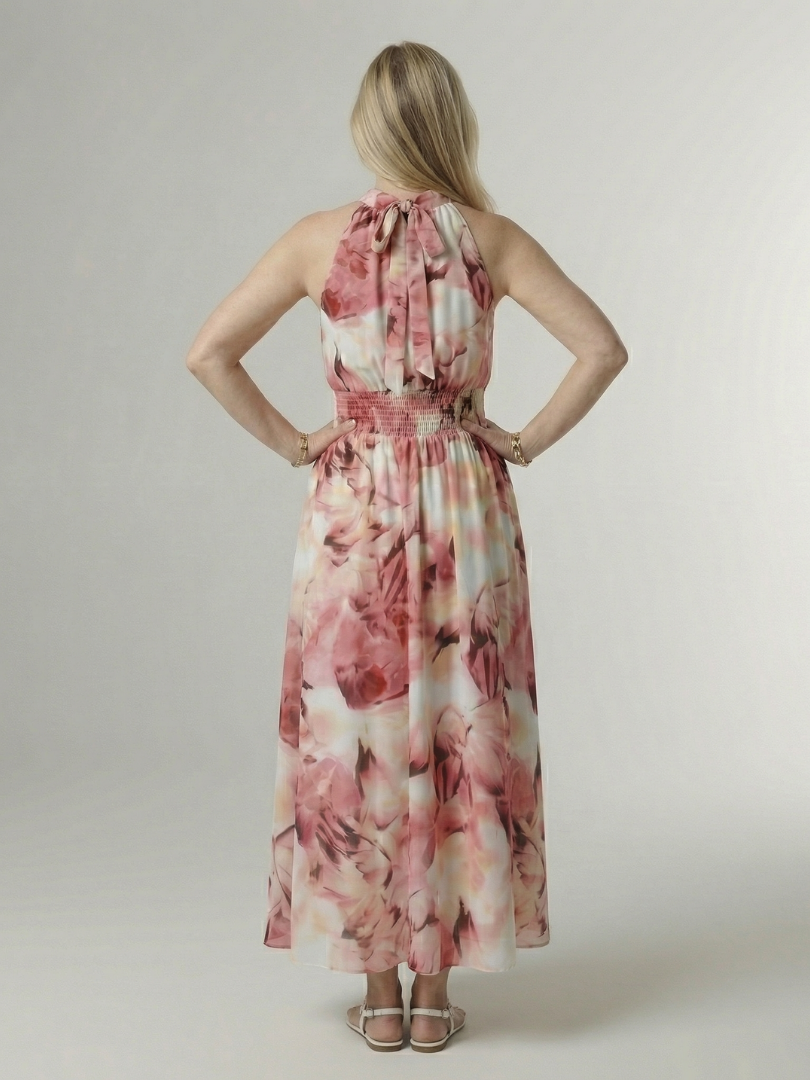 FJØRNA women's summer midi dress with halter neck, sleeveless design, flowy fabric, perfect for warm weather.