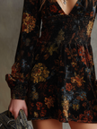 FJØRNA women's mini dress with retro floral print, pleated waist, and velvet fabric, perfect for stylish and feminine occasions.
