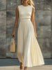 Cream chiffon pleated maxi dress by FJØRNA, casual dress with flowing fabric and elegant pleats, ideal for summer or special occasions.