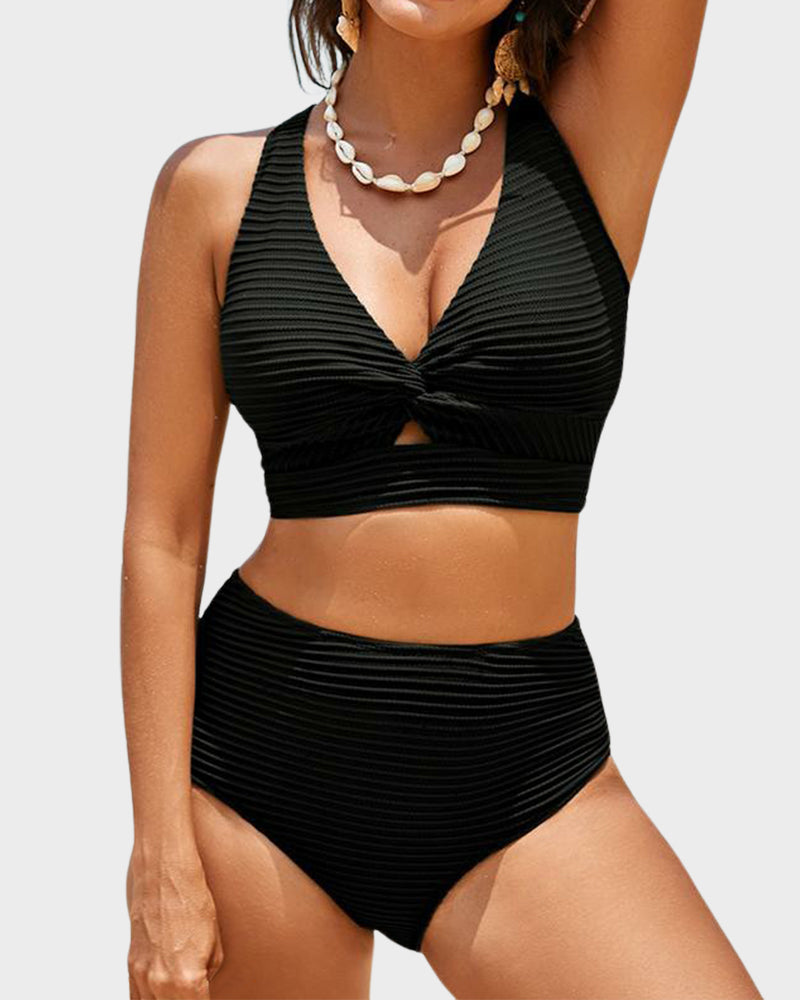 FJØRNA women's bikini set featuring a flattering fit, with a stylish top and matching bottom for summer swimwear.