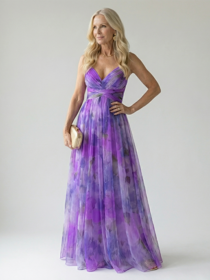 FJØRNA women's sleeveless wrap summer maxi dress with floral pattern, flowing fabric, and V-neck design.