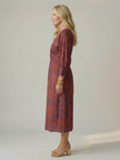 FJØRNA women's summer midi dress with long sleeves and wrap style, lightweight fabric in a casual, elegant design.