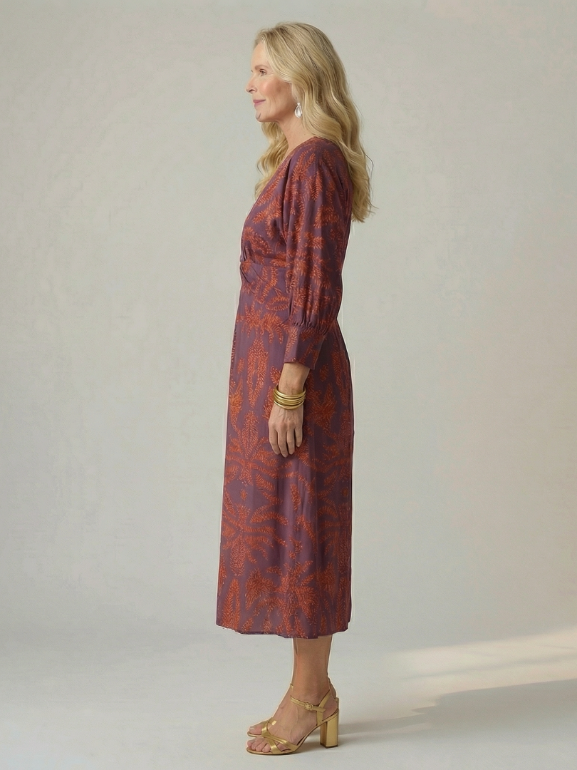 FJØRNA women's summer midi dress with long sleeves and wrap style, lightweight fabric in a casual, elegant design.