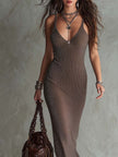 FJØRNA knit V-neck maxi dress for women, featuring a soft, fitted silhouette and elegant length, perfect for casual or dressy occasions.