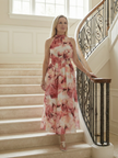 FJØRNA women's summer midi dress with halter neck, sleeveless casual style, shown in light fabric on a model.