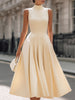 FJØRNA Luxe Cream sleeveless turtleneck pleated midi dress for women, featuring a white elegant design and flowing pleats.