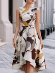 FJØRNA abstract floral sleeveless fit and flare midi dress with a vibrant floral pattern and elegant silhouette.