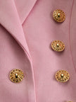 Pink faux suede and fur blazer from FJØRNA featuring a multi-button lapel, tailored jacket with stylish details.
