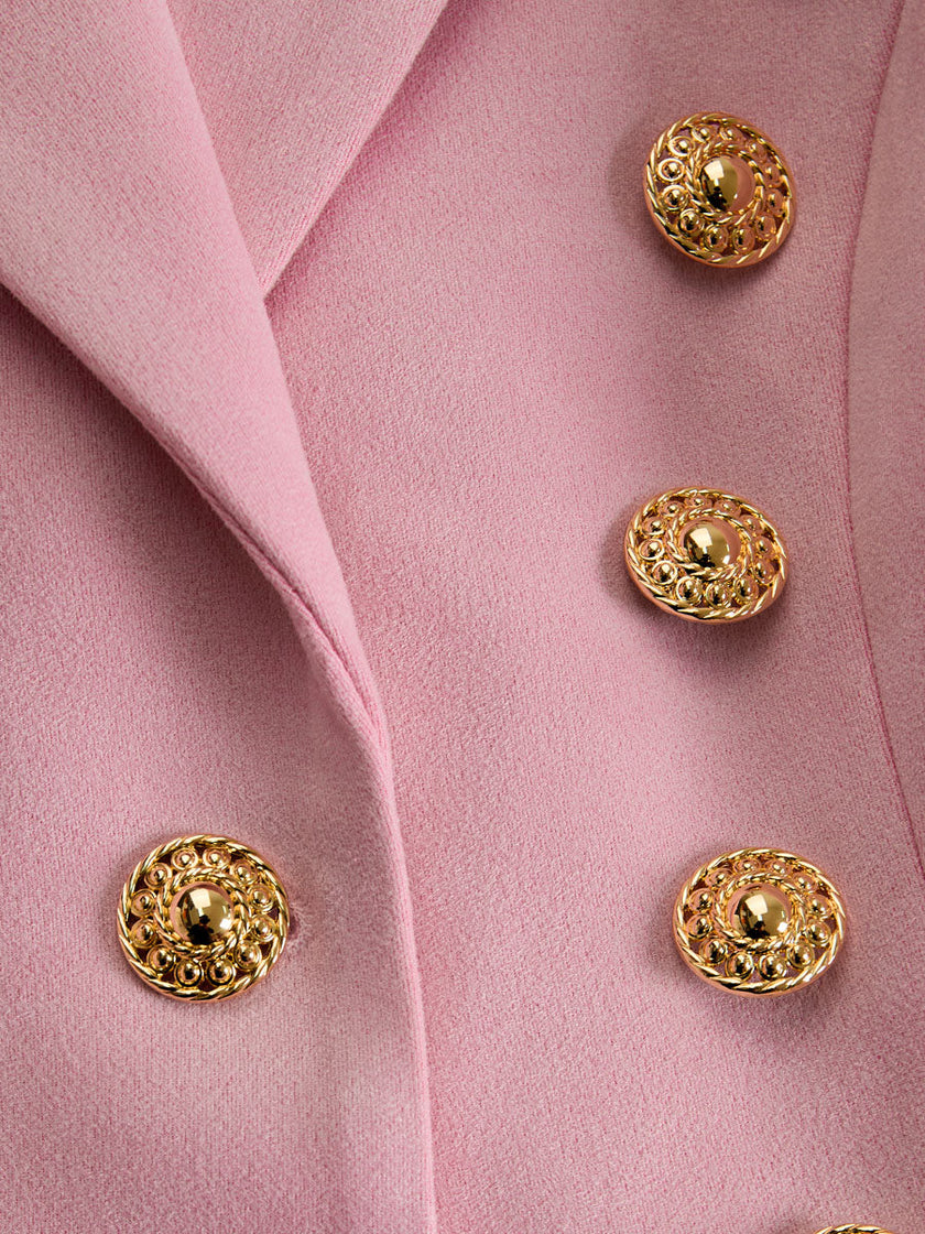 Pink faux suede and fur blazer from FJØRNA featuring a multi-button lapel, tailored jacket with stylish details.