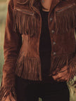 FJØRNA brown suede western tassel zip-up jacket with fringe details, casual style, and button closure on front.
