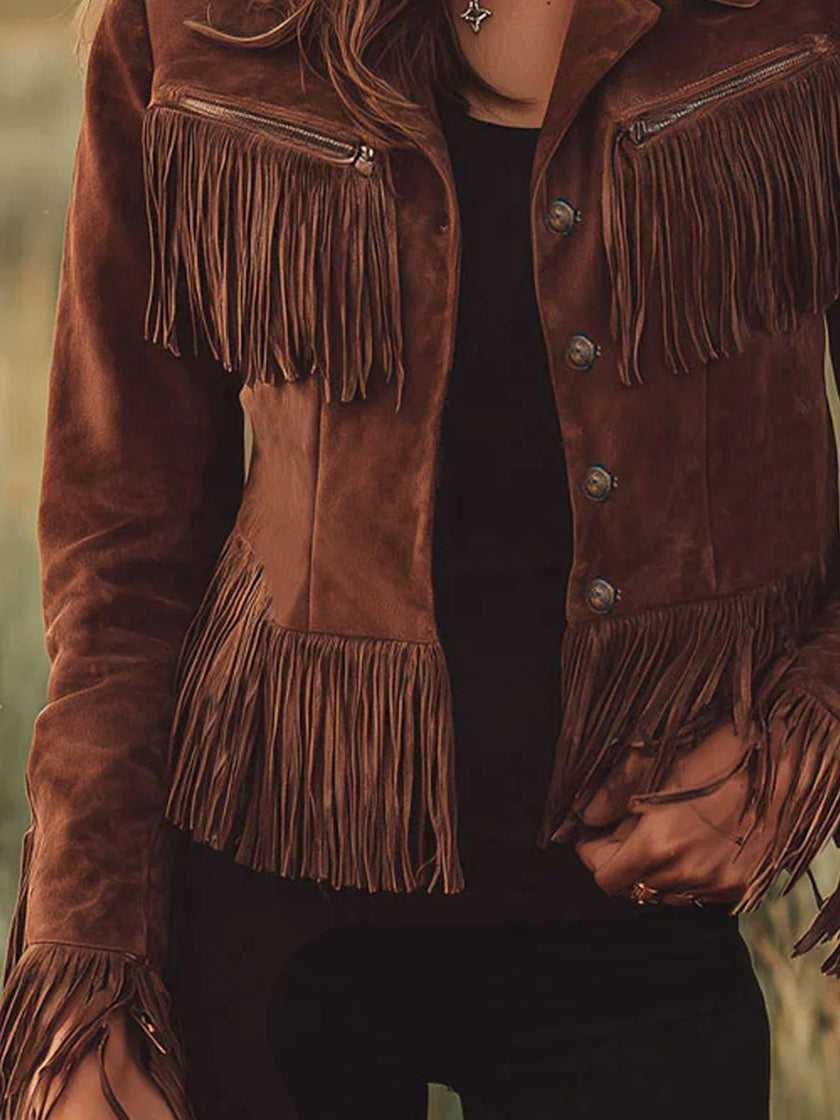 FJØRNA brown suede western tassel zip-up jacket with fringe details, casual style, and button closure on front.