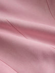 Pink faux suede and fur blazer with multi-button lapel, stylish jacket from FJØRNA featuring a chic, textured design.