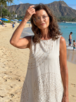 Flowy lightweight summer midi dress for women by FJØRNA, featuring breathable fabric and a relaxed fit.