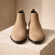 FJØRNA men's slip-on Chelsea boots in black leather with elastic side panels and sleek design.