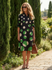 FJØRNA women's summer dress with polka dots and pockets, casual style, lightweight fabric, sleeveless, perfect for warm weather.